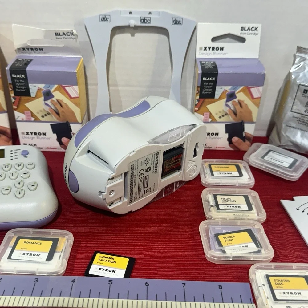 Xyron Design Runner Cordless Handheld Printer, Disc Maker, 6 Inks, 9 Design Disc